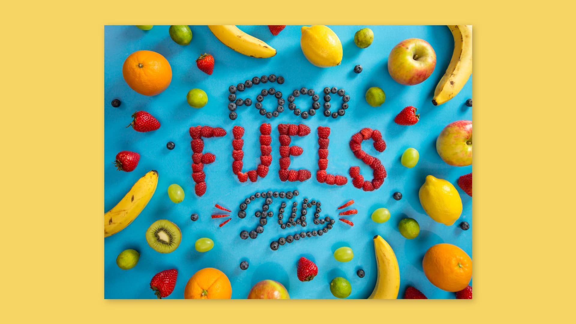 Colorful blueberries and strawberries spelling out “Food Fuels Fun”