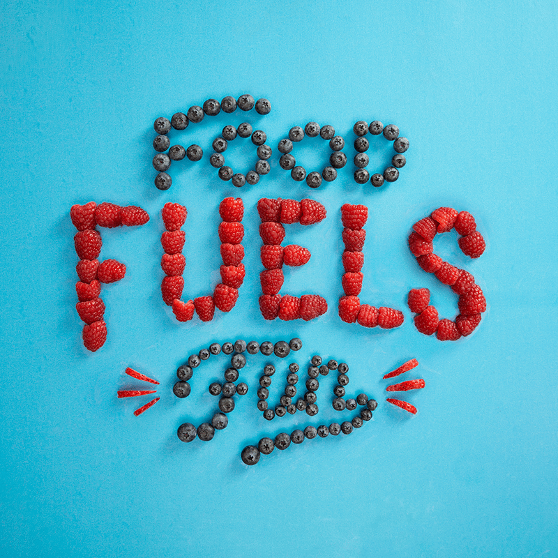 Food Fuels Fun spelled out in strawberries and blueberries